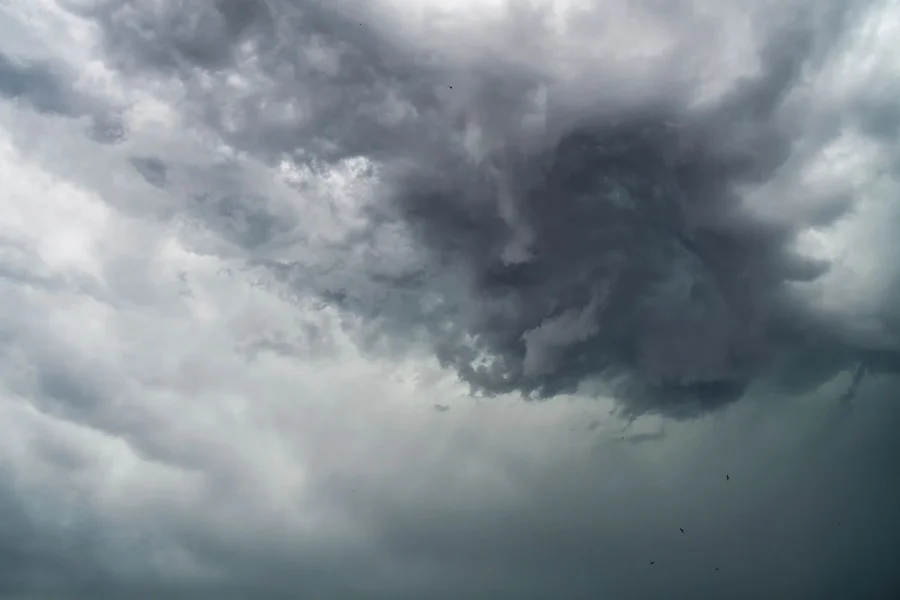 Storm clouds wind dark sky